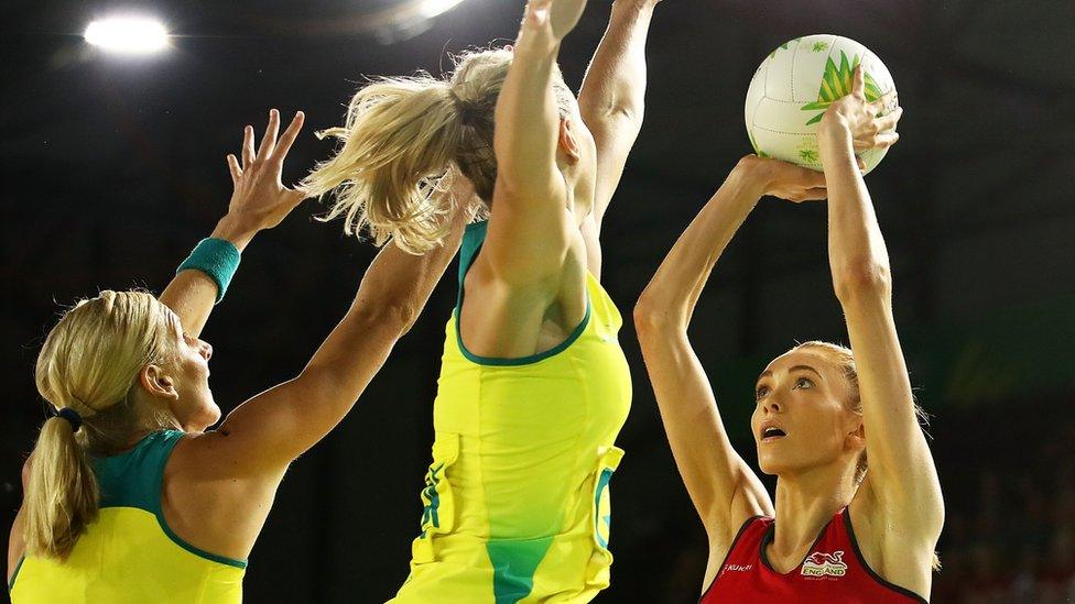 Helen Housby of England (R) shoots under pressure during the Netball Gold Medal Match on day 11 of the Gold Coast 2018 Commonwealth Games at Coomera Indoor Sports Centre on April 15, 2018 on the Gold Coast, Australia.