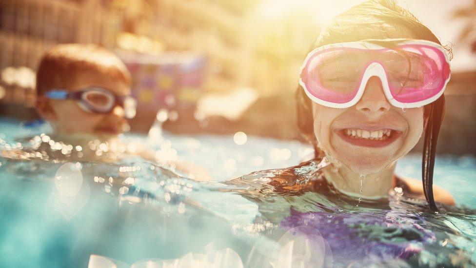 Kids playing in swimming pool