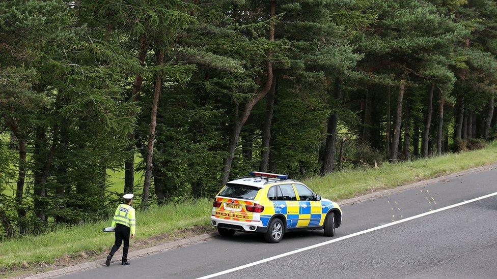 police at the scene of the crash