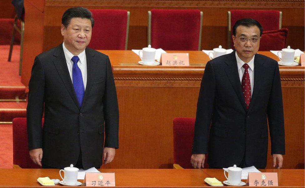 Chinese President Xi Jinping (L) and Chinese Premier Li Keqiang