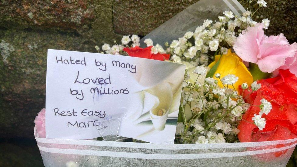 Floral tributes outside the scene of the attack