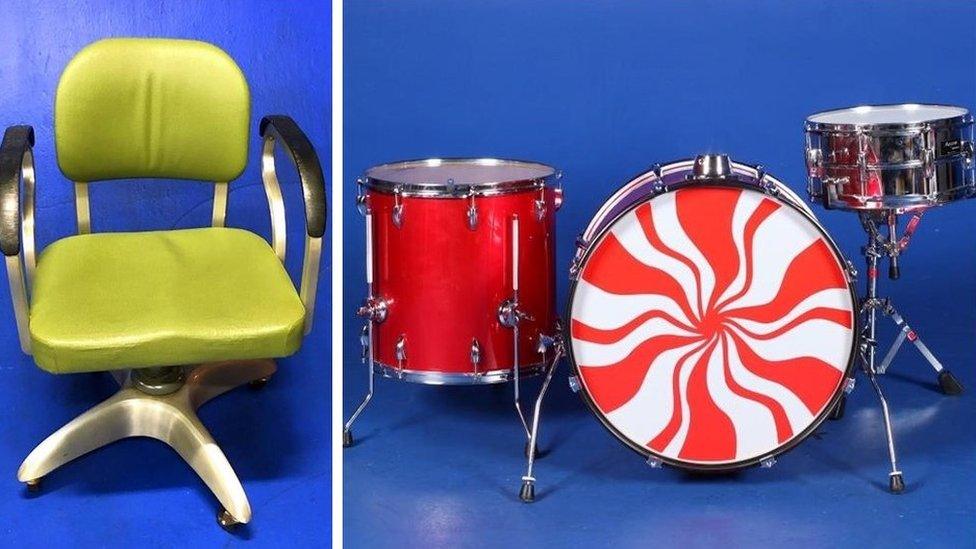 The green chair and White Stripes drum kit