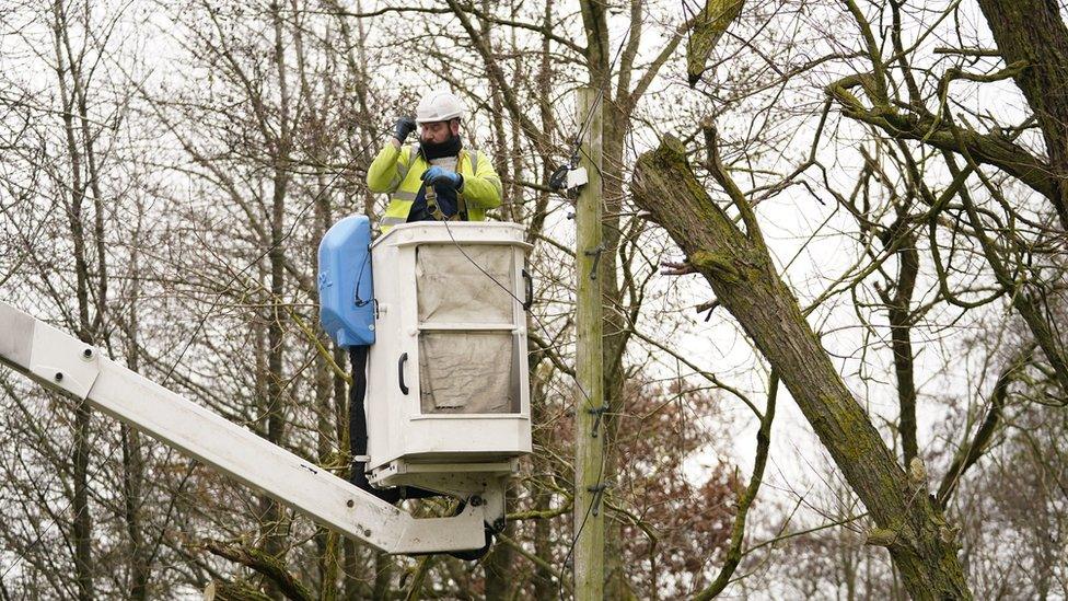 An Openreach engineer fixes telephone lines near Barnard Castle in County Durham in the aftermath of Storm Arwen