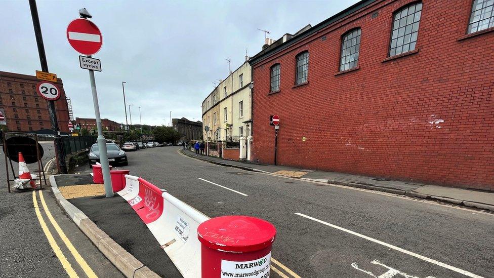 View of roadblocks and no entry sign on Avon Crescent