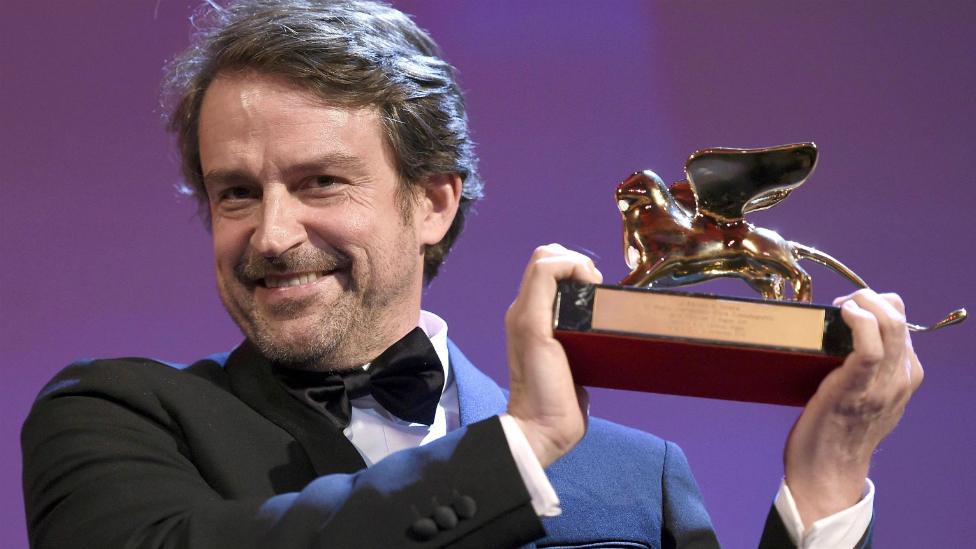 Venezuelan director Lorenzo Vigas holds the Golden Lion after receiving the award for Desde Alla at the Venice Film Festival - 12 September 2015