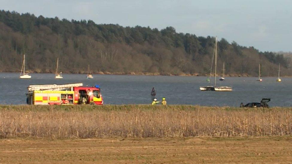 Emergency services rescue flooded cars from The Strand near Orwell Bridge