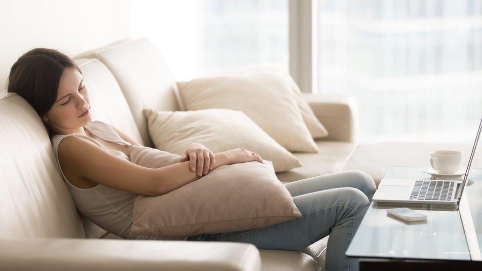 Young girl sleeping on the sofa