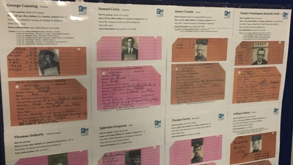 A display of sailors' identity cards