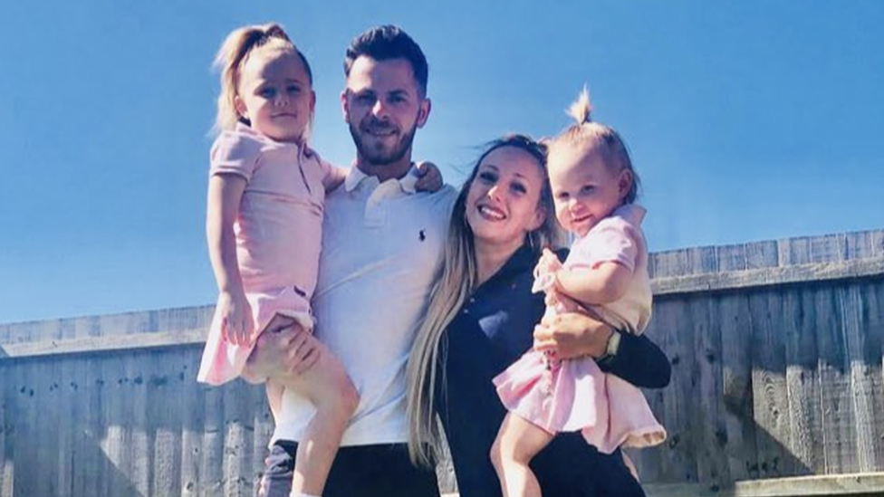 Tom Clasby with his fiance and two daughters