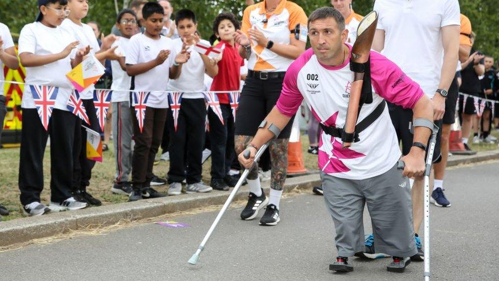 Ben Parkinson with Commonwealth baton