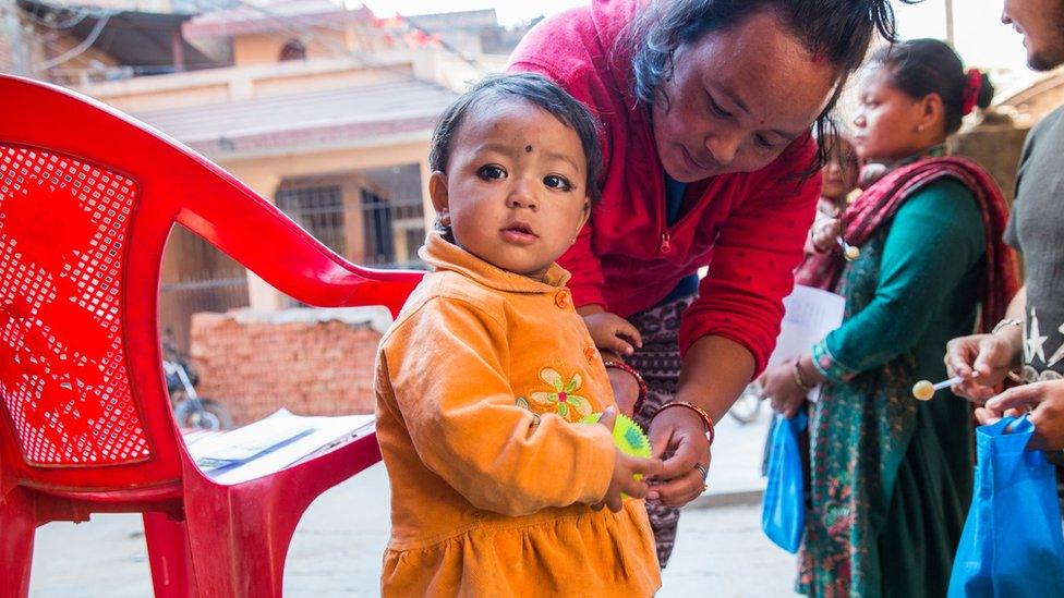 Child being vaccinated