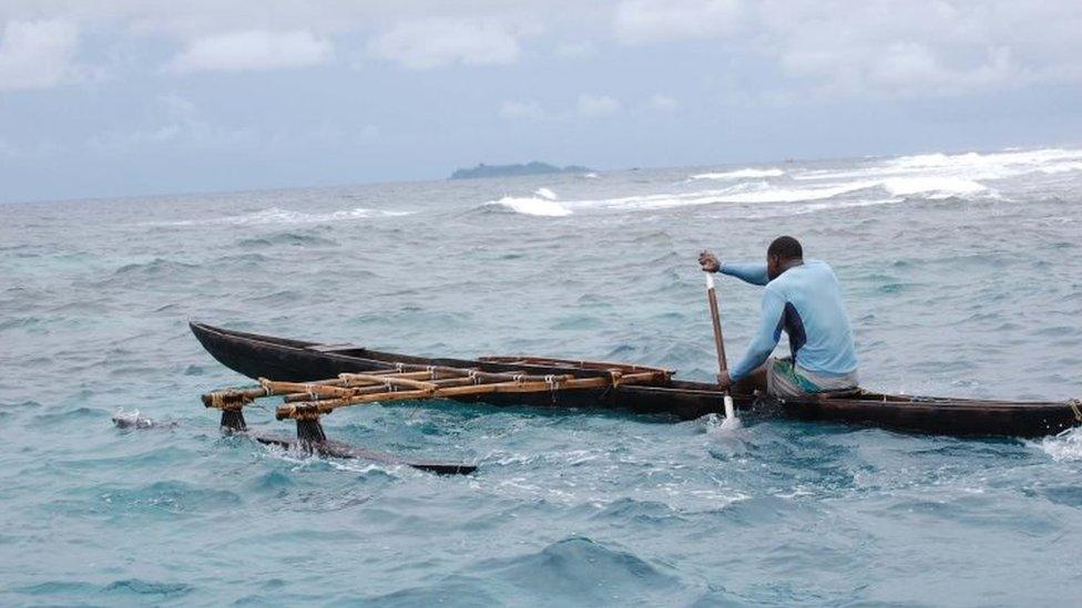 Canoe off the coast of Papua new Guinea