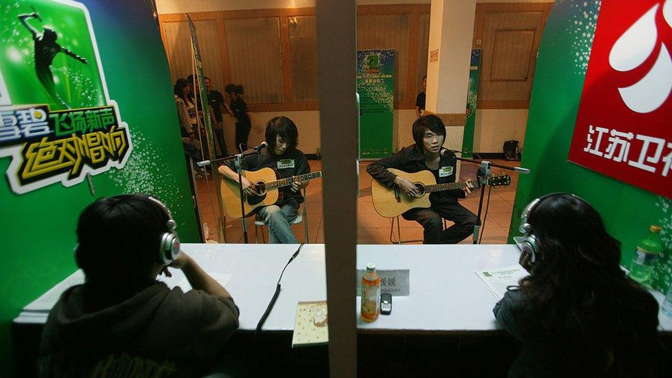 Contestants perform during the 'Absolutely To Sing Sound' TV Show on 26 April 2008 in Nanjing of Jiangsu Province, China. 'Absolutely To Sing Sound' is an entertainment program produced by Jiangsu TV station to select sing stars