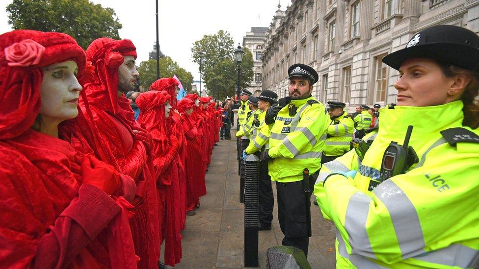 Activists protesting outside the Cabinet Office