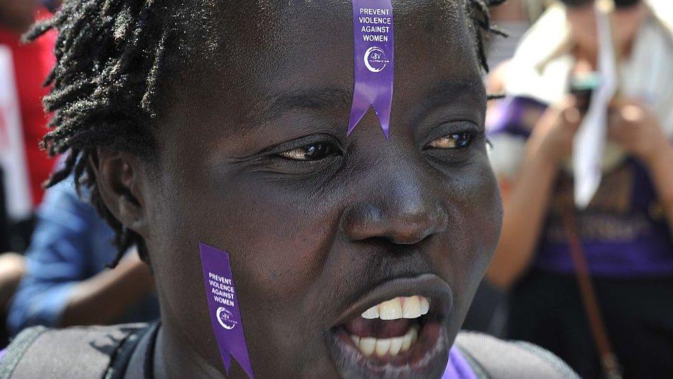 A women shouts slogans during a rally protesting violence towards women, on November 17, 2014 in the Kenyan capital Nairobi.