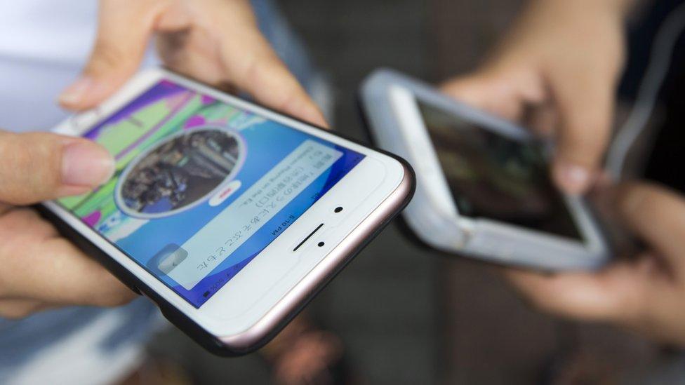 People play Pokemon Go in Tokyo, Japan