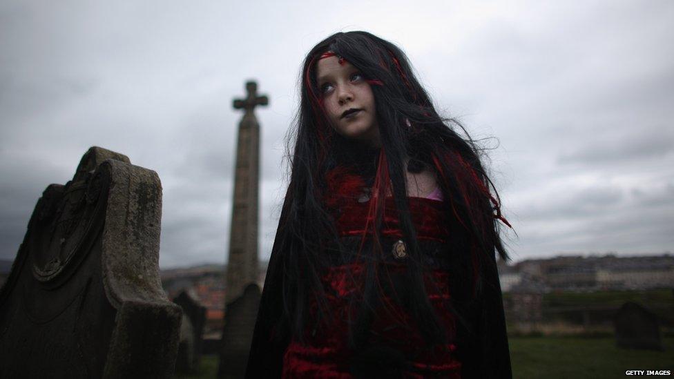 Goth having her picture taken in Whitby graveyard