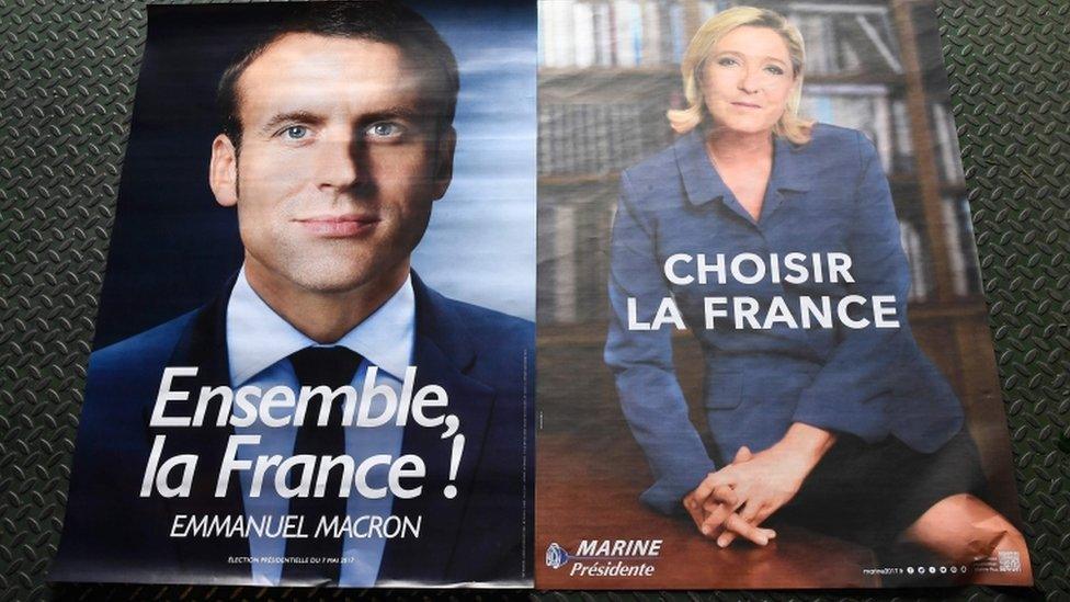 Posters for Mr Macron and Ms Le Pen