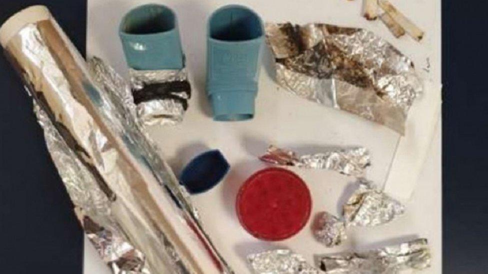 Drugs paraphernalia and inhalers inside the property