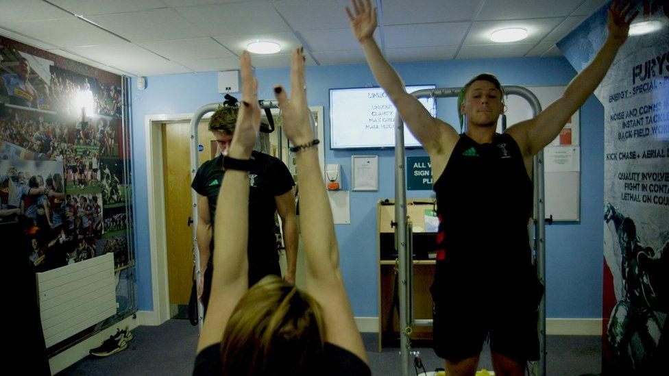 Harlequins players doing yoga