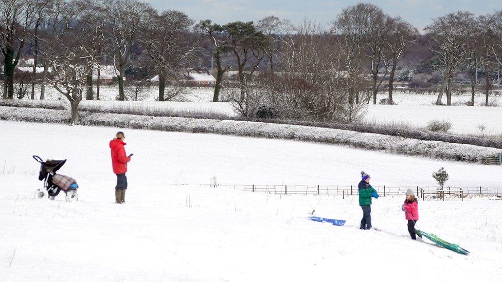 Sledging in the snow near Preston