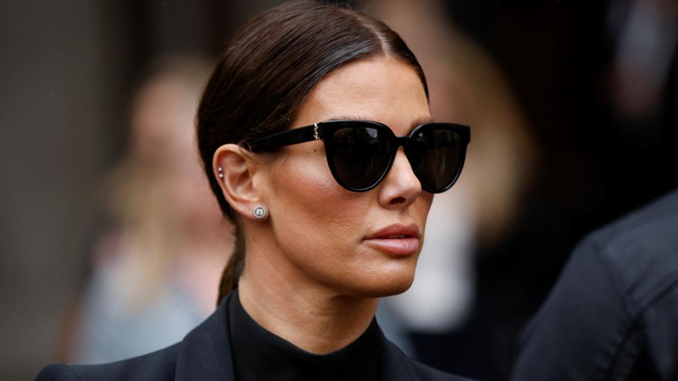 Rebekah Vardy, wife of Leicester City soccer player Jamie Vardy, leaves the Royal Courts of Justice, in London, Britain May 11, 2022.