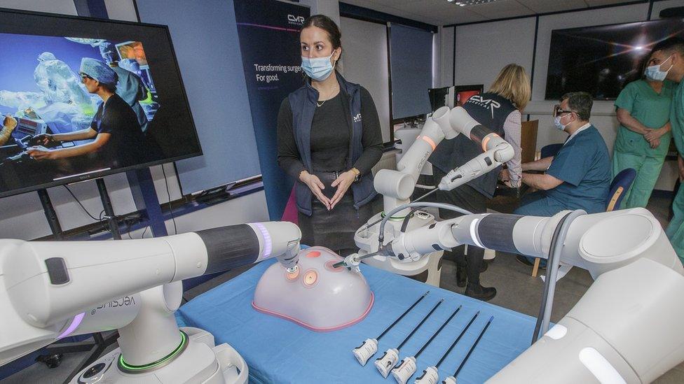 The robotic arms in action on a dummy at Ysbyty Gwynedd. Consultant urologist Mohamed Abdulmajed is at the controls in the background.