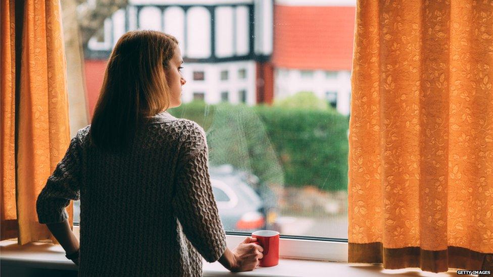 woman at window