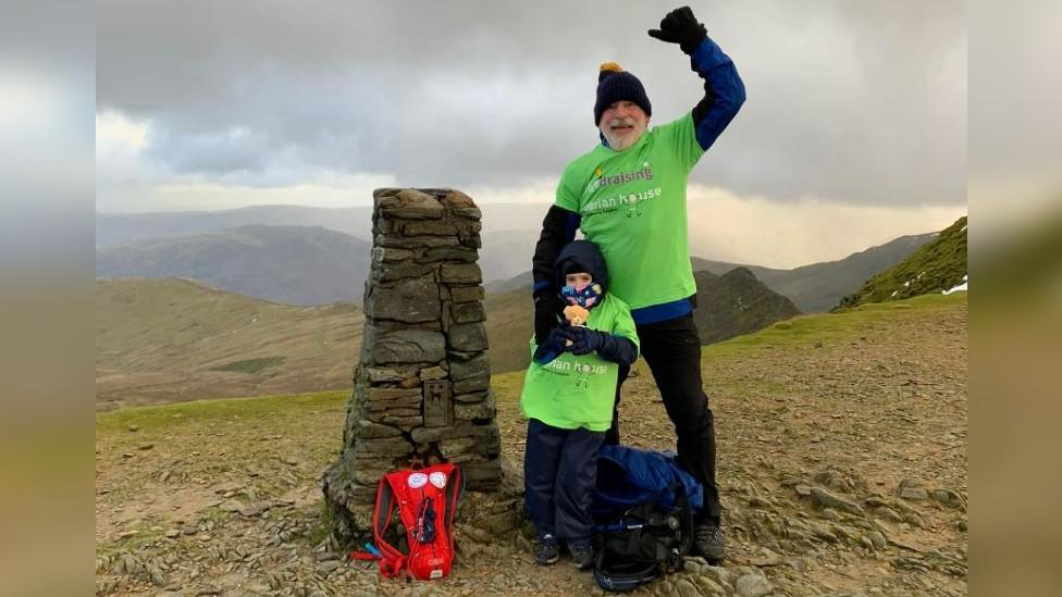 Oscar with his grandad at the top of Helvellyn