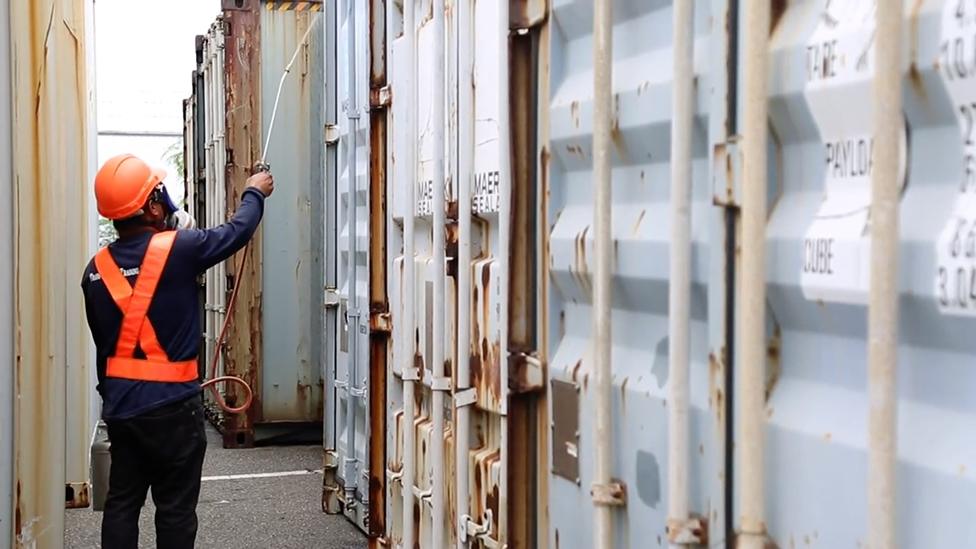 Containers of Canadian waste being fumigated prior to shipping