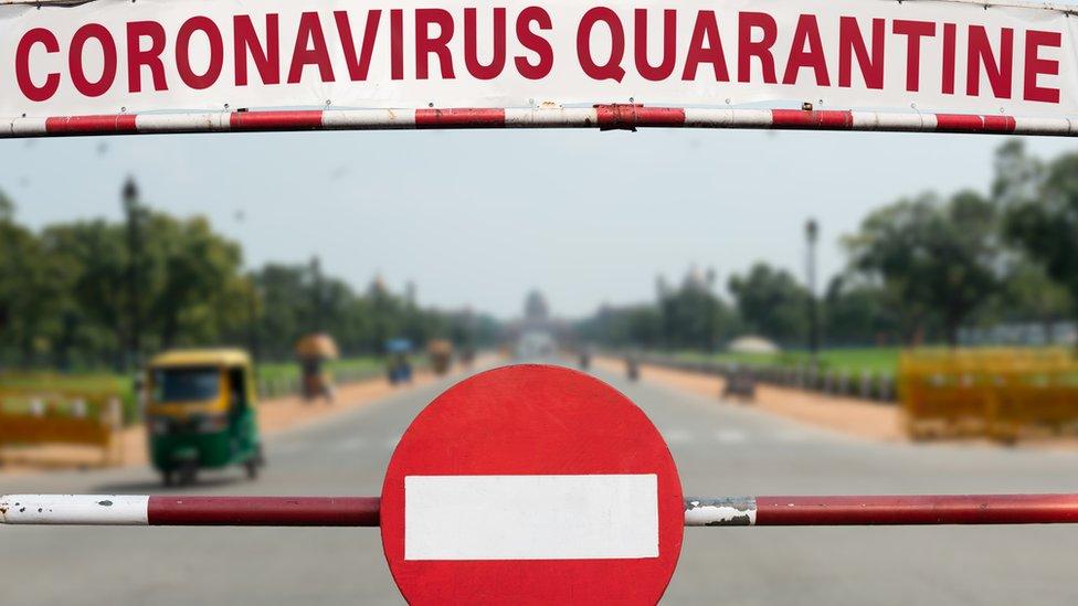 A sign reading Coronavirus quarantine in India