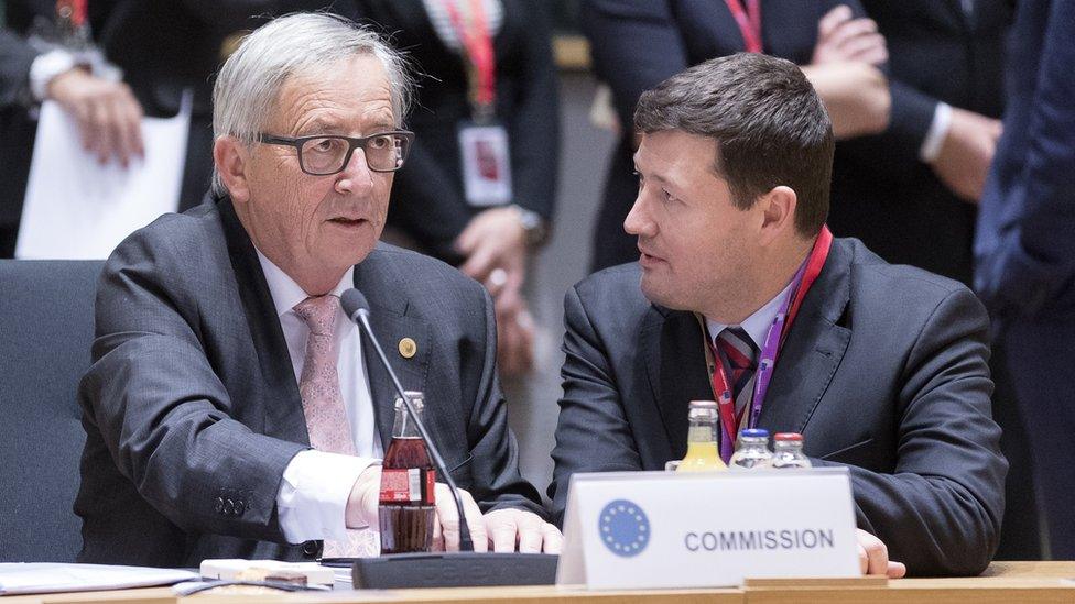 Jean-Claude Juncker (L) is talking with his cabinet chief Martin Selmayr (R) in December 2017