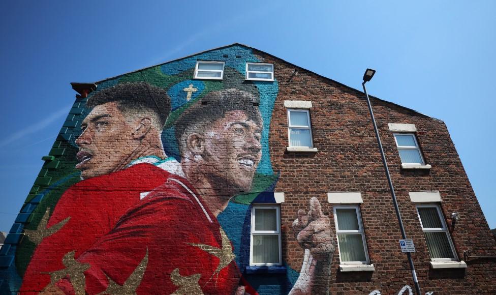 Roberto Firmino can be seen near Liverpool's stadium