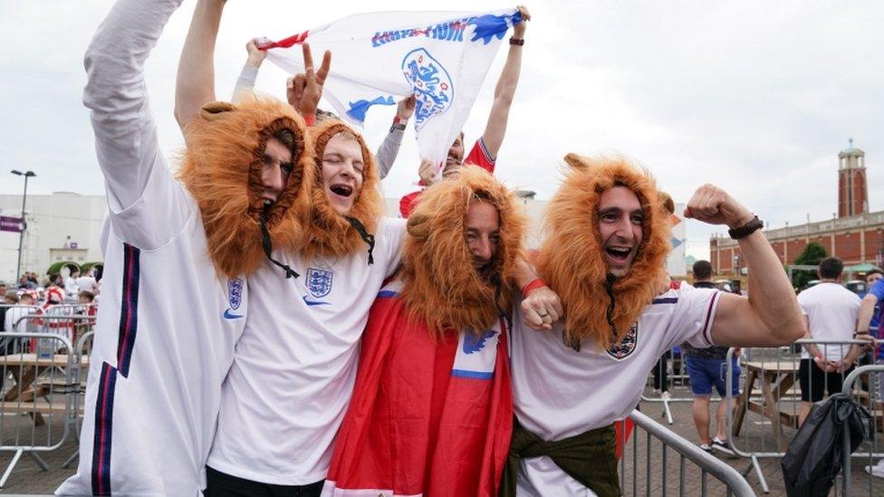 Fans in Manchester watch the Euro 2020 semi final match between England and Denmark.