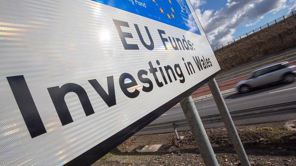 A car passes a European Union funding sign on the newly opened A465 near Ebbw Vale