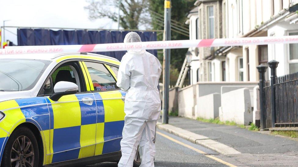 Forensics at the scene of a fire on Armagh Road, Portadown