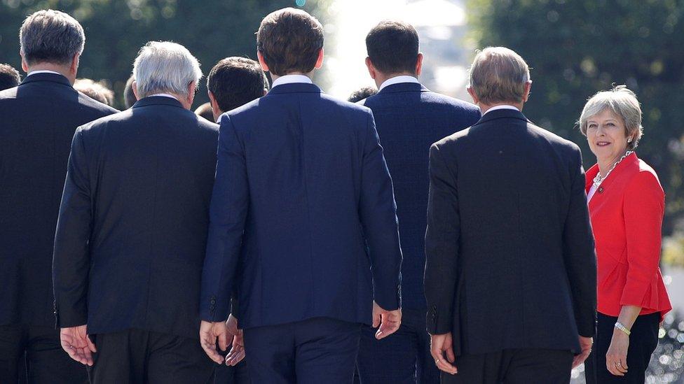 Theresa May arrives for a family photo during the European Union leaders informal summit in Salzburg