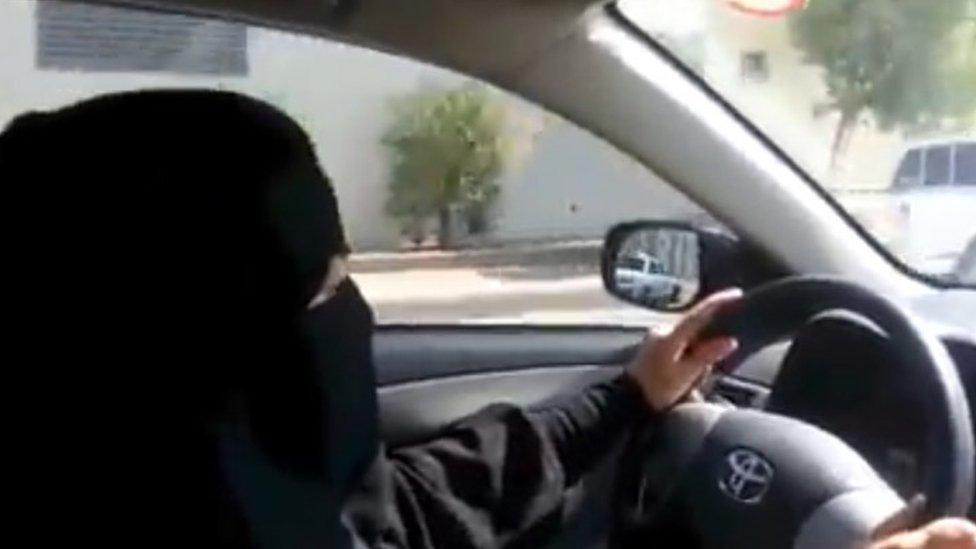 A fully veiled woman driving in Riyadh ahead of a nationwide day of defiance of the female driving ban (17 October 2013)