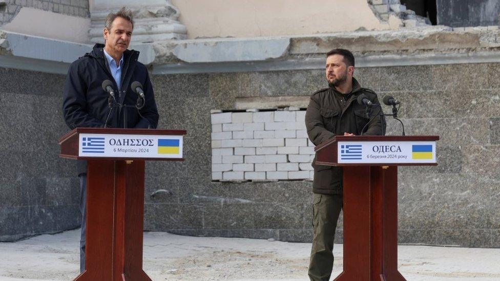 Ukraine's President Volodymyr Zelenskiy and Greek Prime Minister Kyriakos Mitsotakis attend a joint press conference in Odesa on Wednesday