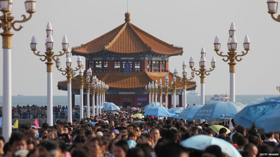 Tourists crammed onto the Zhan Qiao pier in the city of Qingdao