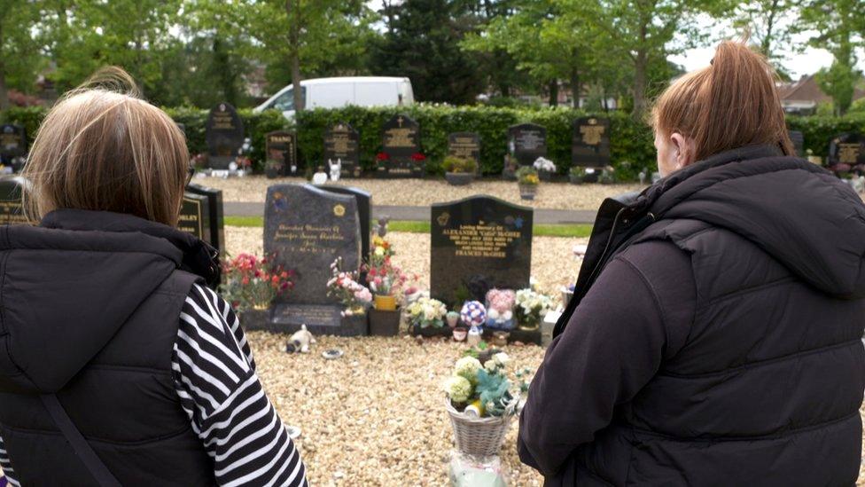 Families at cemetery