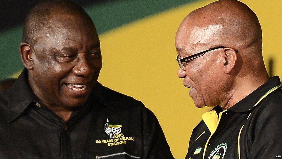 South African President and new re-elected African National Congress (ANC) president Jacob Zuma (R) talks with newly elected deputy president of the party Cyril Ramaphosa during the 53 rd National Conference of the ANC on December 18, 2012 in Bloemfontein