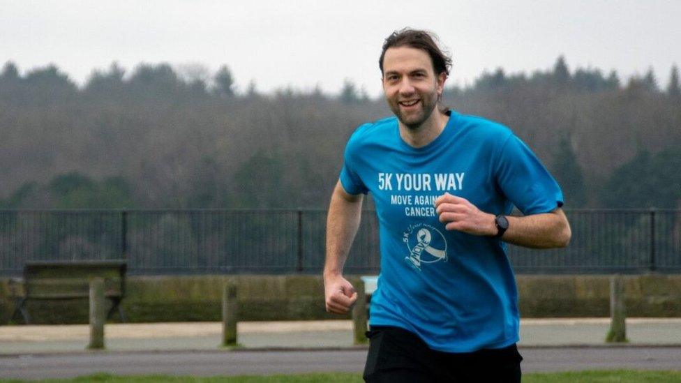 Dr Yani Berdeni in running gear in motion and smiling