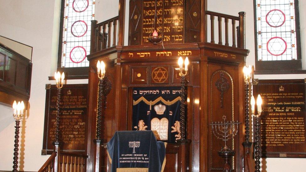 The interior wooden altar with Jewish signs and decorations