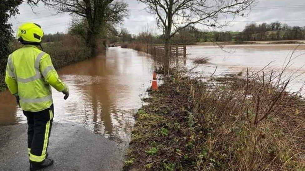 Stranded vehicle in a flood