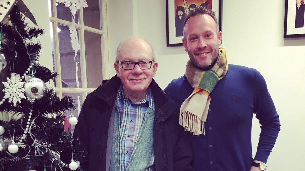 George Stubbs (left) and Mark Richardson standing next to Mark's Christmas tree at his home in Halifax