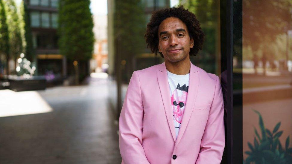 Joseph Coelho, the children's laureate, smiling outside