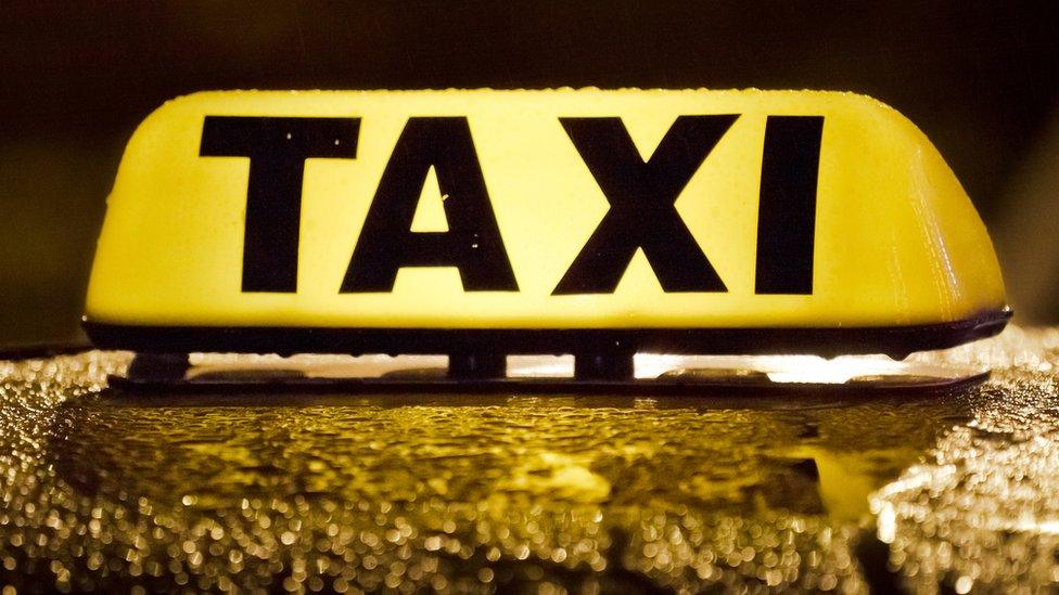 A taxi sign