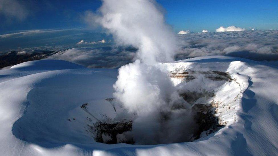 A handout photo made available by the Colombian Geological Service shows the activity of the Nevado del Ruiz volcano, near Manizales, Colombia, 31 March 2023.