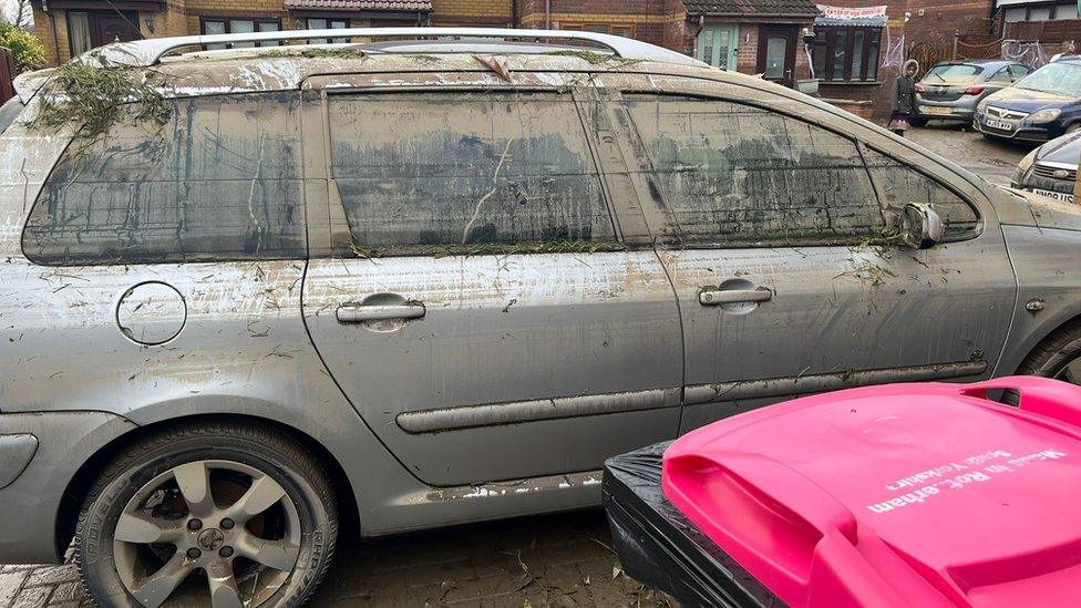 A car covered in mud